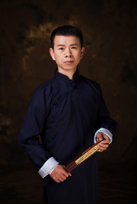 周军（“一种时钟型练字格”发明人）