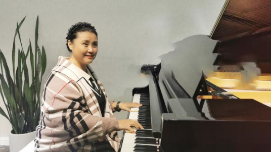 张晓谦(沈阳音乐学院音乐教育系讲师)